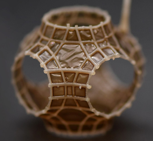 Soap-coated cellular lattice with graphene oxide film